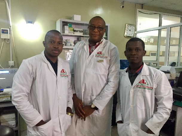 Image of three lab technicians, including Elochukwu Adibo