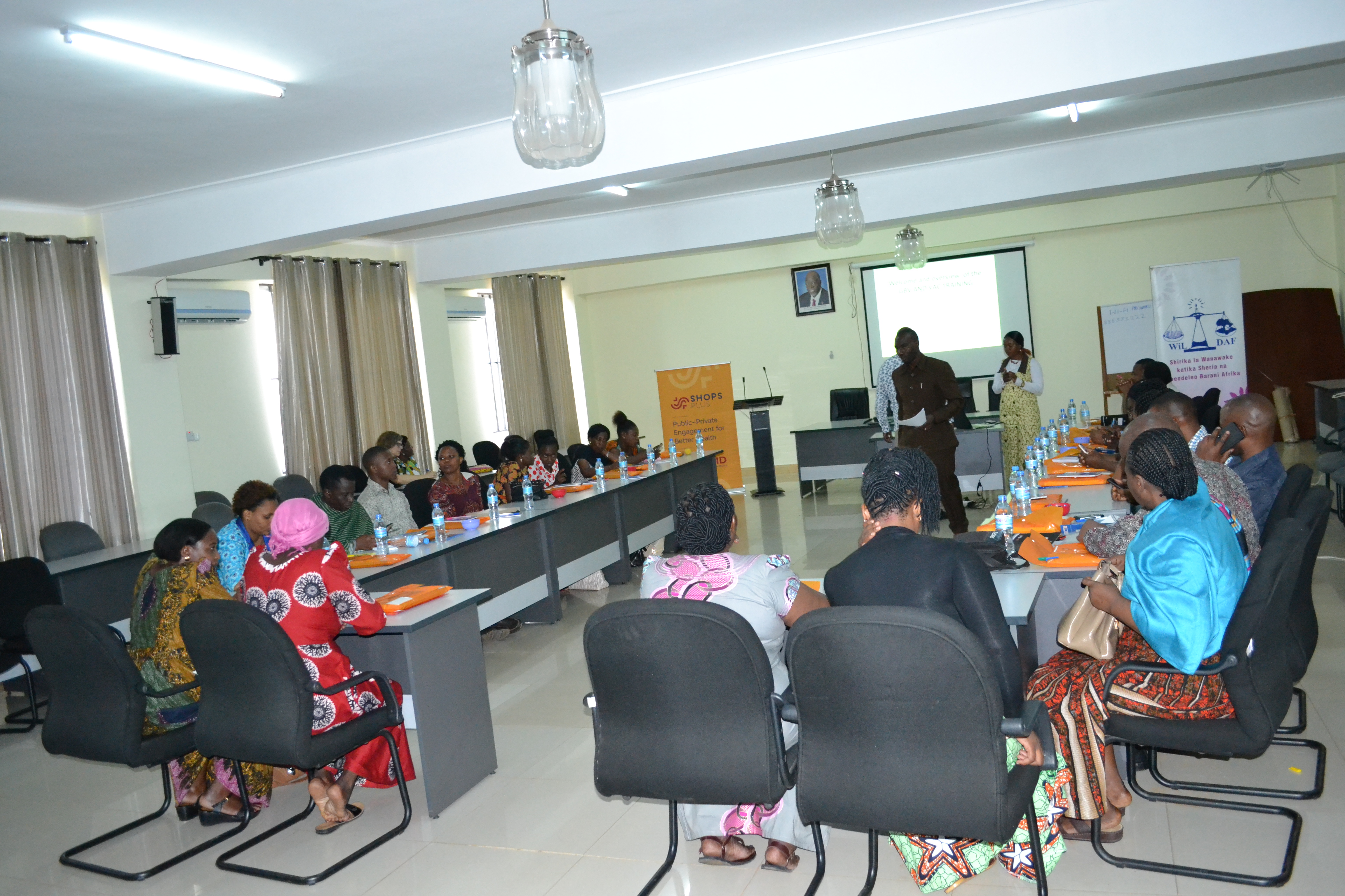Conference room with people attending a gender based violence training