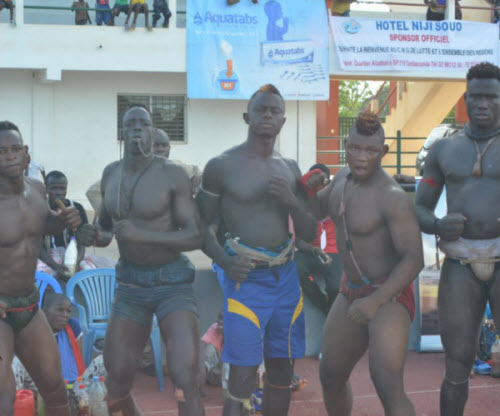Senegalese wrestlers partaking in a traditional dance session – a wrestler’s ritual