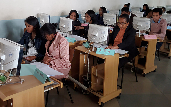 Participants using computers during the training