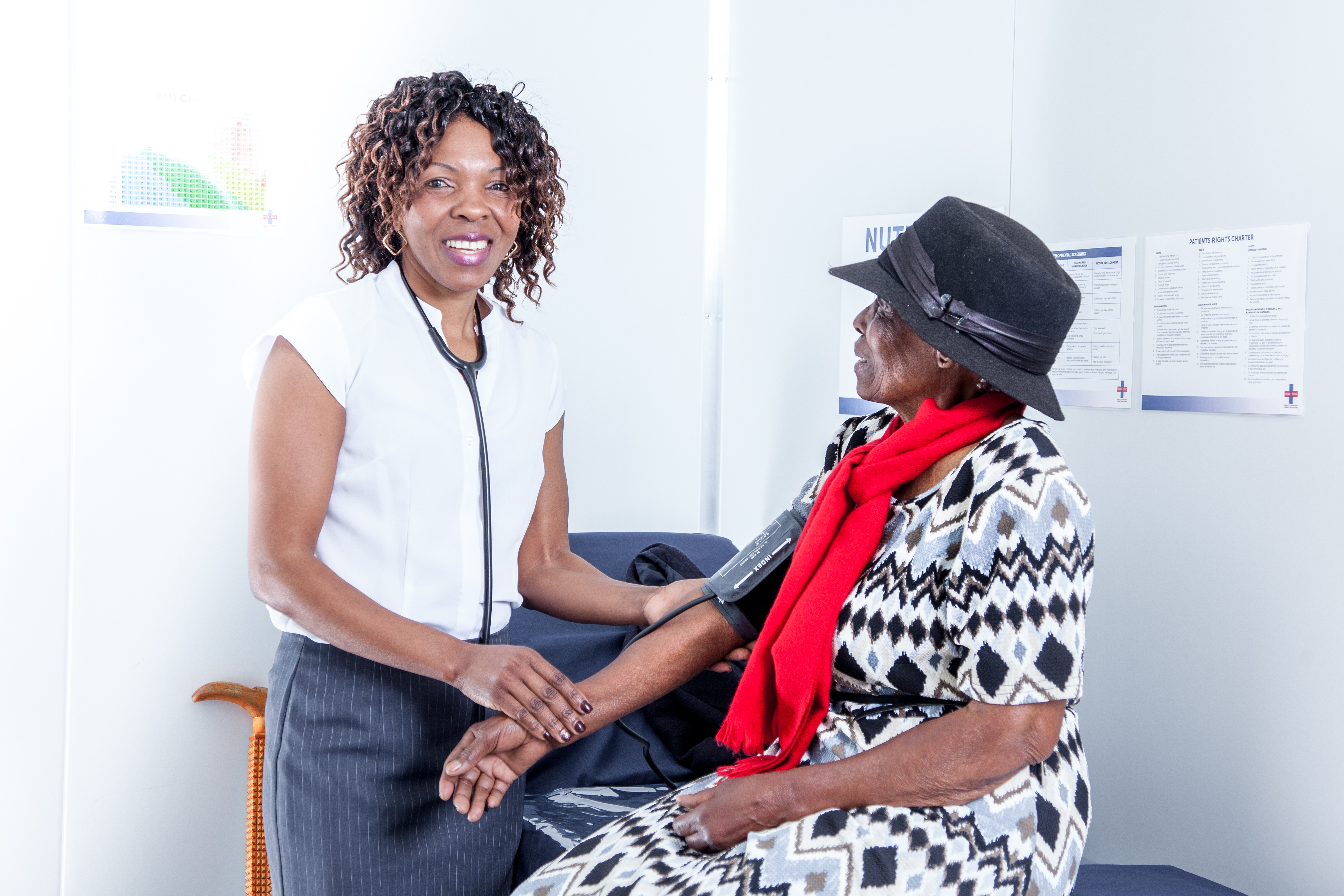 Mpumi Moremi takes care of a patient at the Kanyamanzane Clinic.