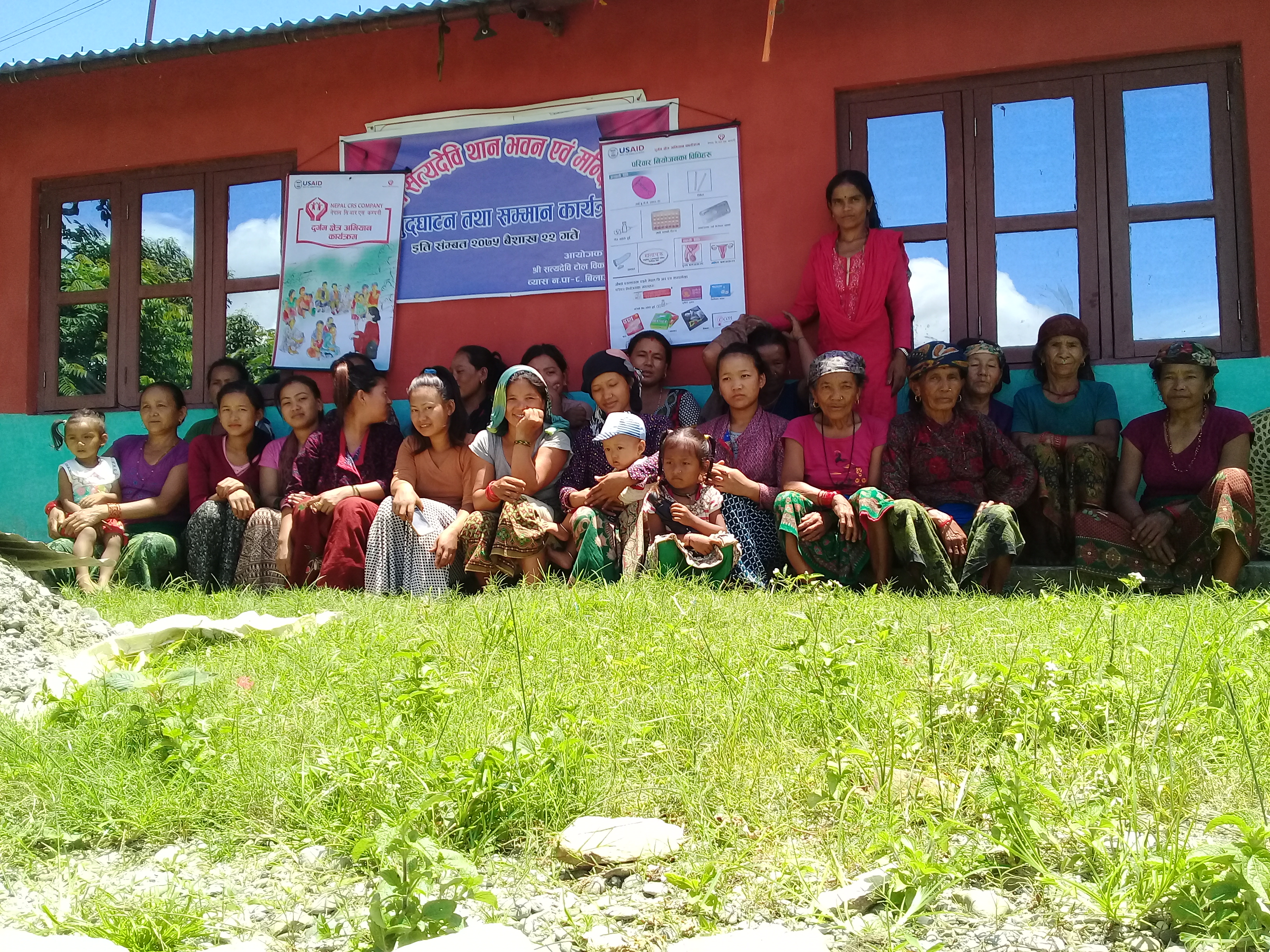 Group photo of women outside a building following FP session 
