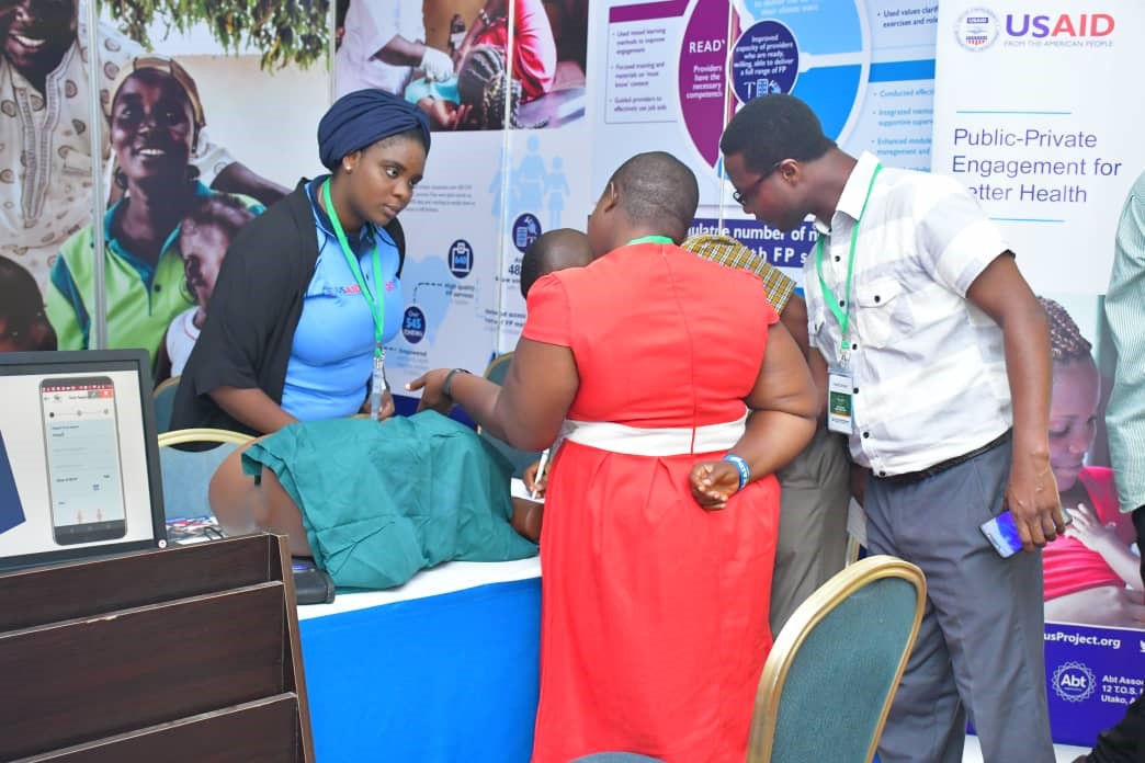A SHOPS Plus staff member demonstrating the models used during FP provider training.