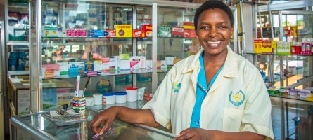 a female pharmacist in a drug shop