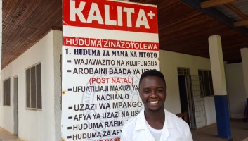 Isaya Bruno standing outside the Kalita clinic in Tanzania