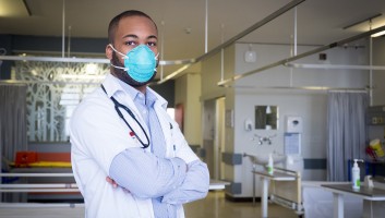 A health provider in South Africa with a mask